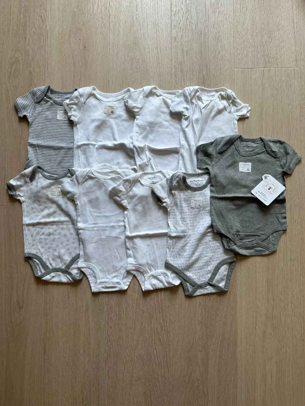 9 Piece Set of Baby Onesies 12M